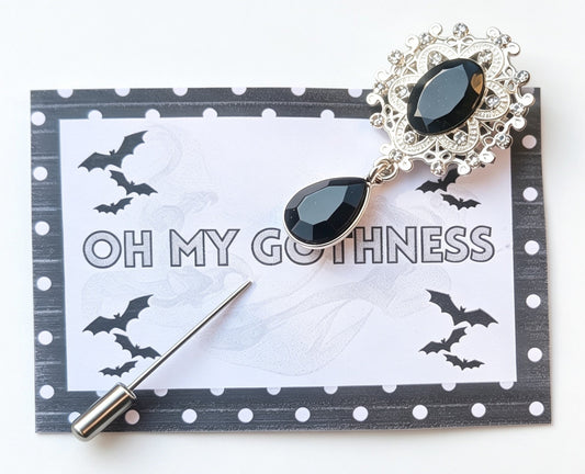 Decorative black and silver tone metal lapel pin with diamante detailing. - Oh My Gothness