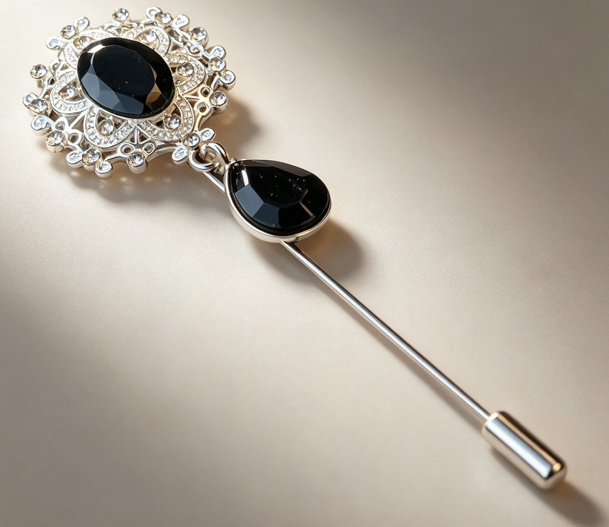 Decorative black and silver tone metal lapel pin with diamante detailing. - Oh My Gothness