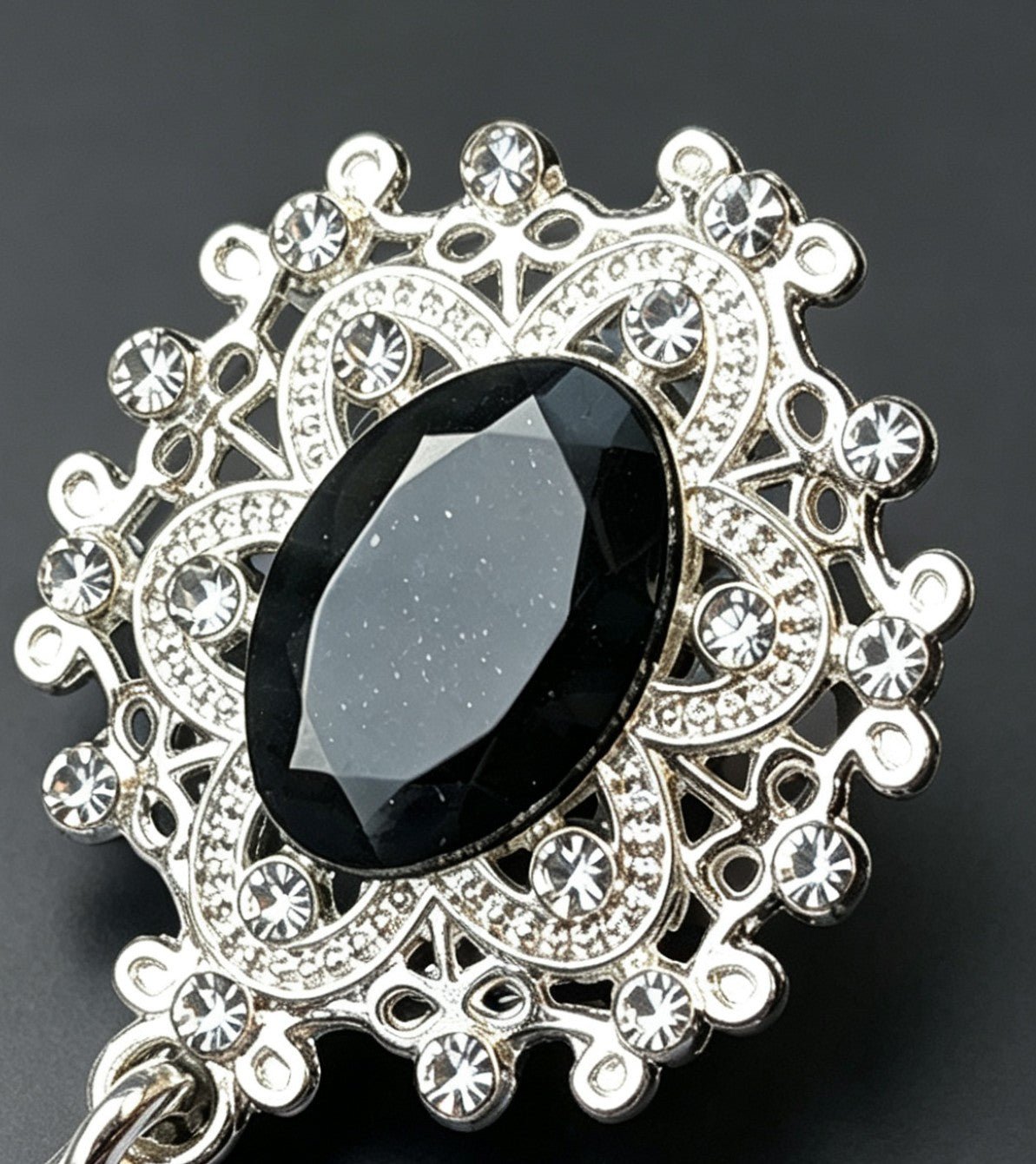 Decorative black and silver tone metal lapel pin with diamante detailing. - Oh My Gothness