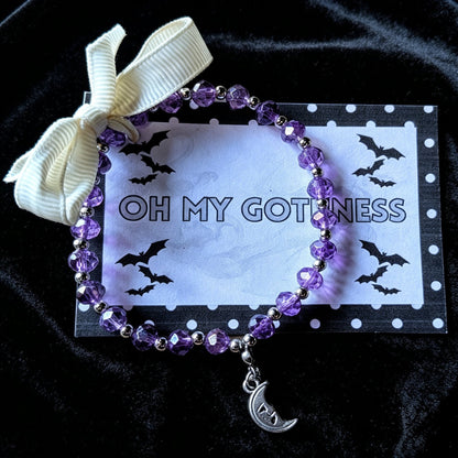 Handmade purple and silver beaded bracelet with a crescent moon pendant. - Oh My Gothness