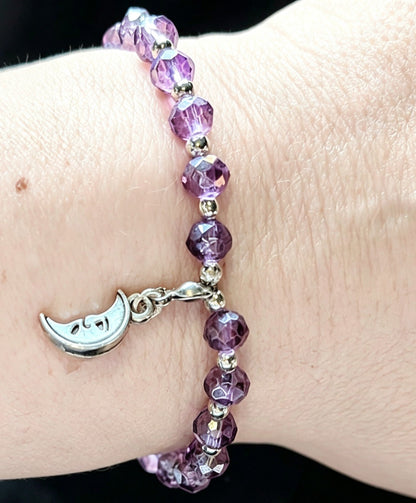 Handmade purple and silver beaded bracelet with a crescent moon pendant. - Oh My Gothness