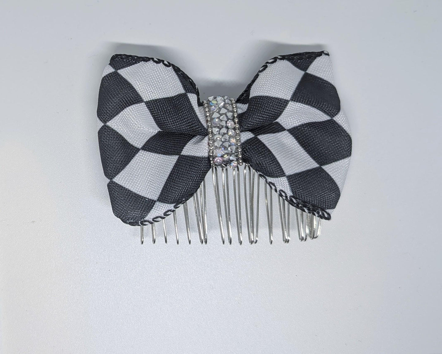 Black + White large check hair bow on a metal comb with rhinestones centre. Goth rockabilly party accessory fun punk gift ladies or girls