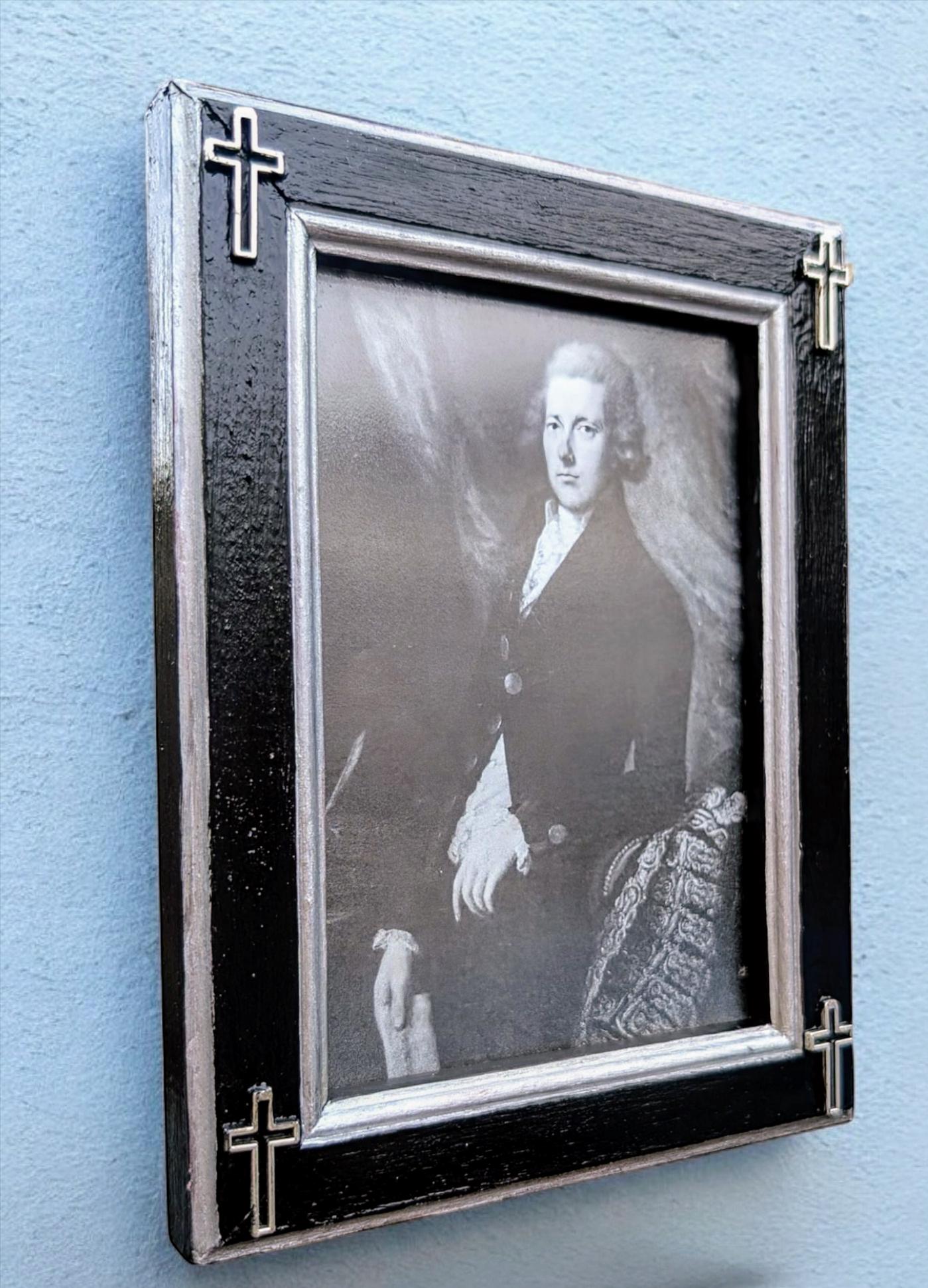 Small 3.5" x 5" wall hanging gothic photo frame. Hand painted black and silver with hollow corner crosses. Gothic inspired home decor gift