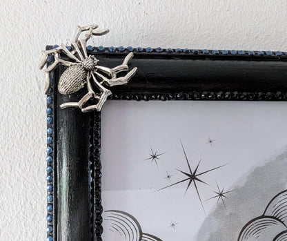 8 x 10" landscape gothic inspired picture photo frame hand painted black. Embellished with smokey blue/grey + black gems, spiders + cobweb