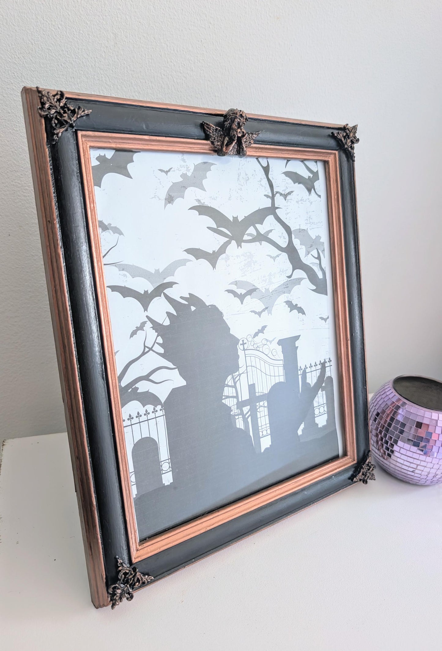 10 x 8" portrait freestanding picture photo frame. Copper/bronze tone and black with cherubs and decorative corner detailing goth home gift