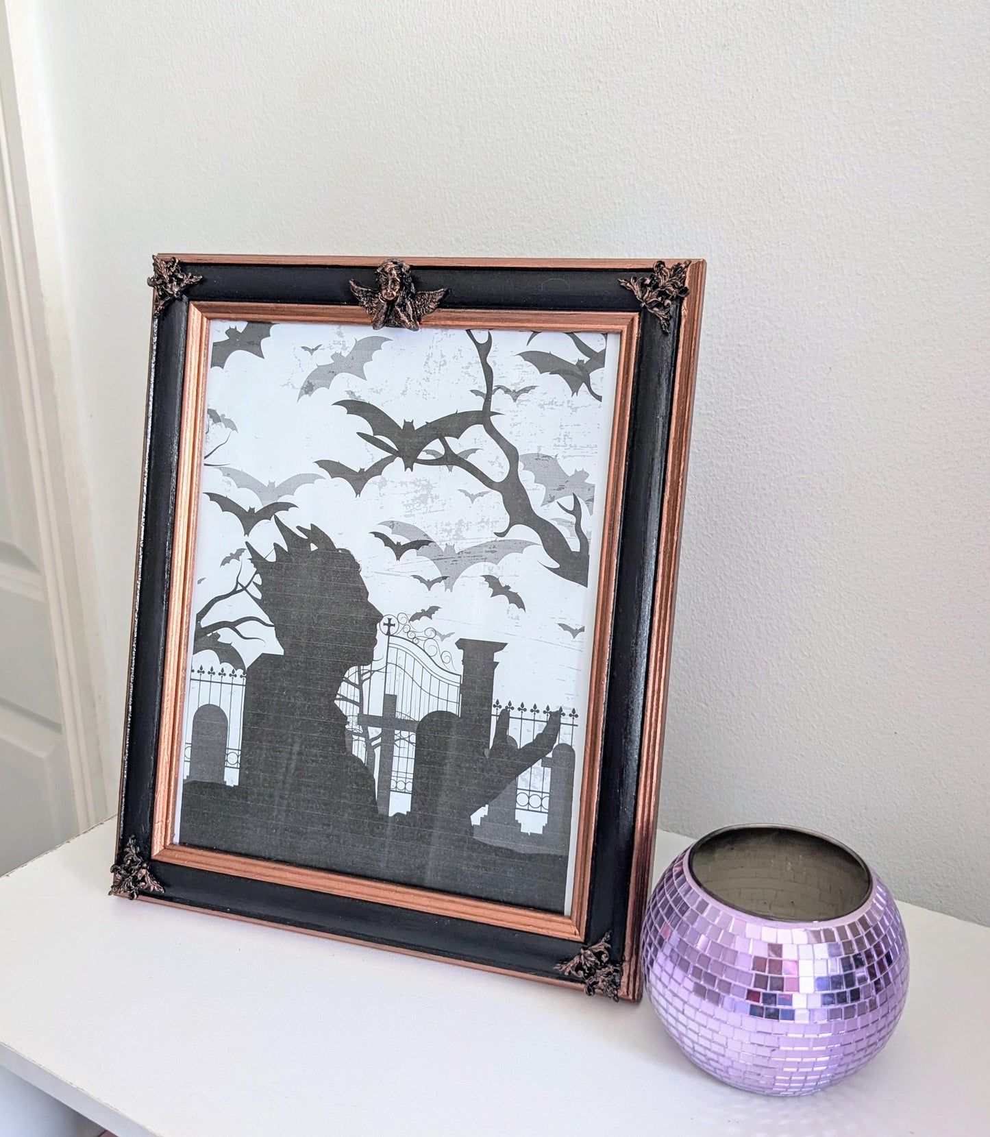 10 x 8" portrait freestanding picture photo frame. Copper/bronze tone and black with cherubs and decorative corner detailing goth home gift