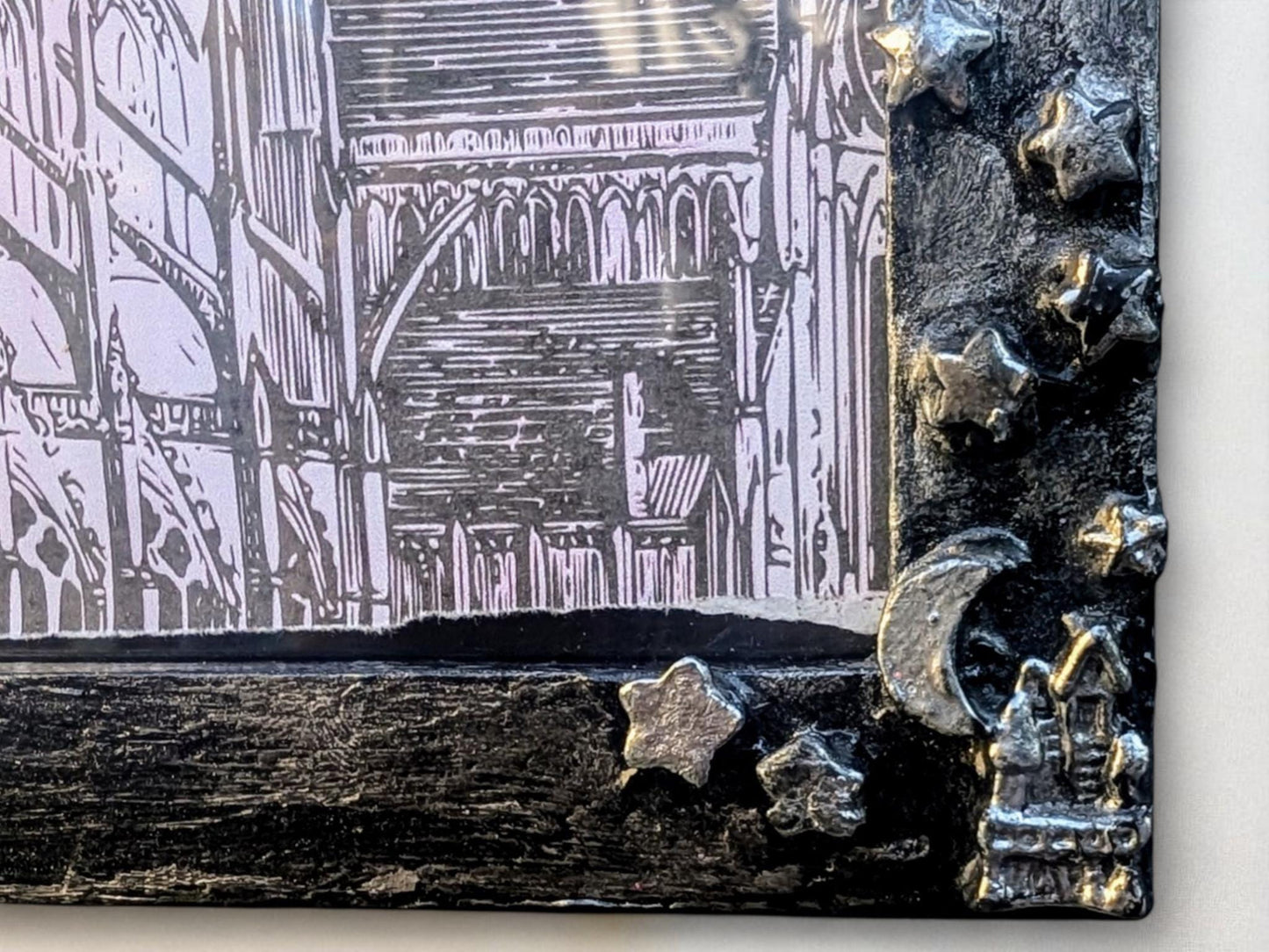 9 x 7" landscape wall hanging photo frame. Hand painted and embellished with gothic charms, stars, spooky house, crescent moon. House gift
