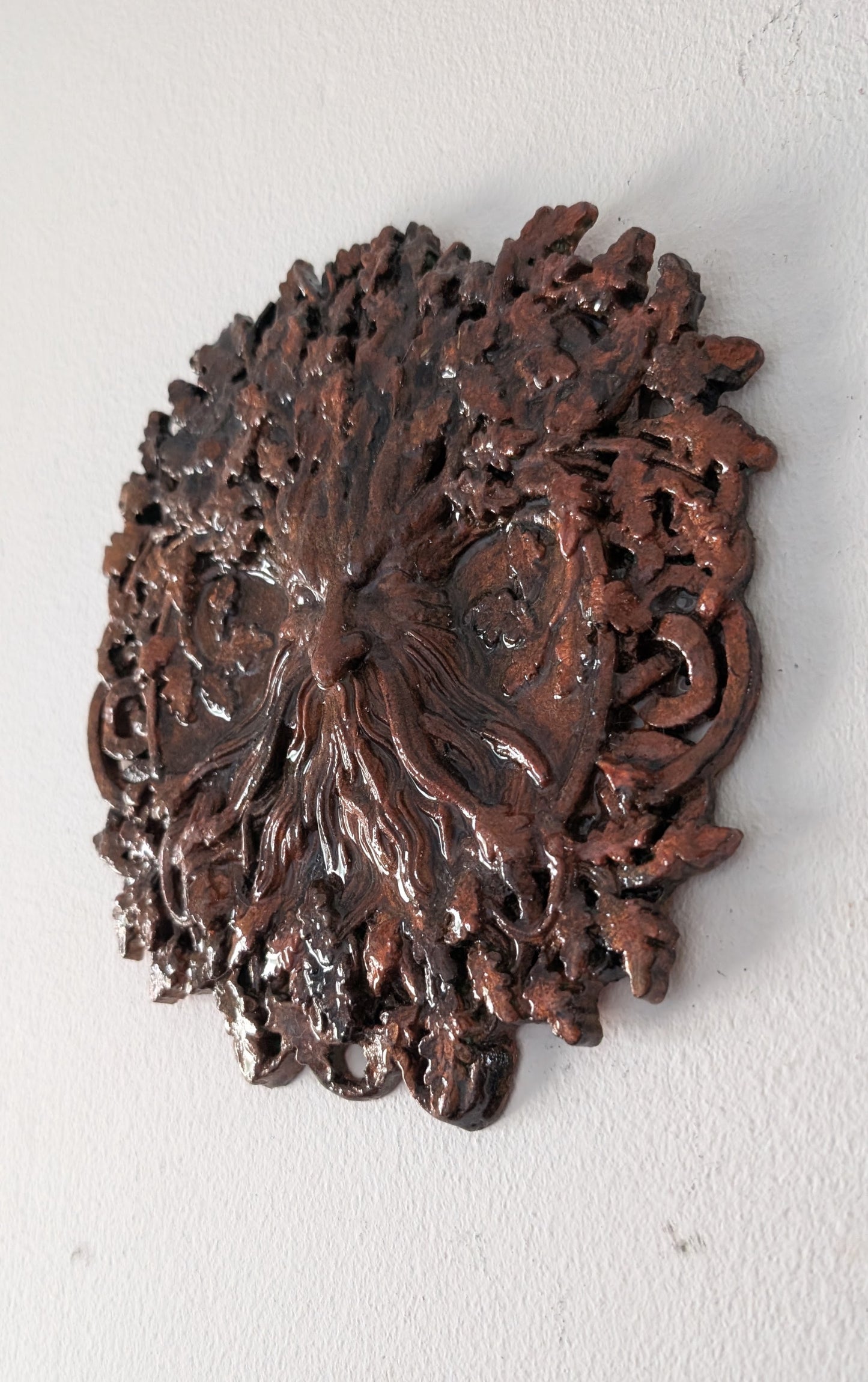 Handcast Green man wall hanging plaque in copper tones. Pagan Home Decor