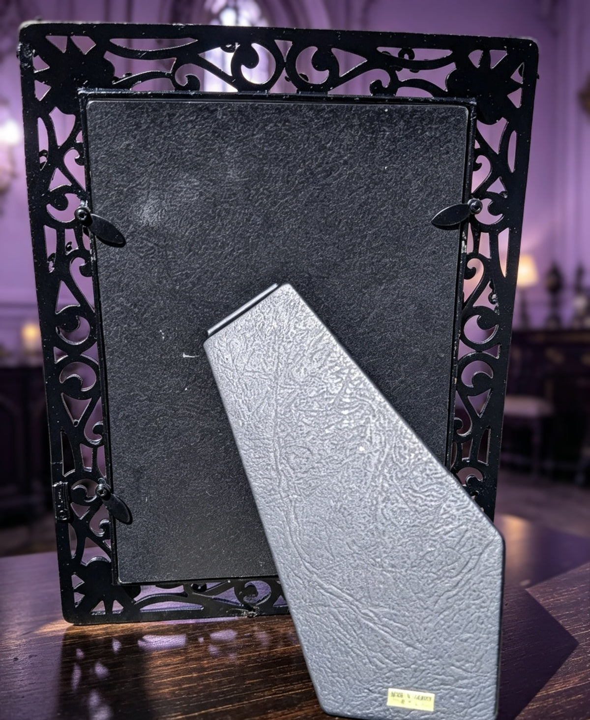 5 x 7" Free-Standing Metal Picture Frame. Hand Painted Black Distressed Style with Ornate Snake detailing..